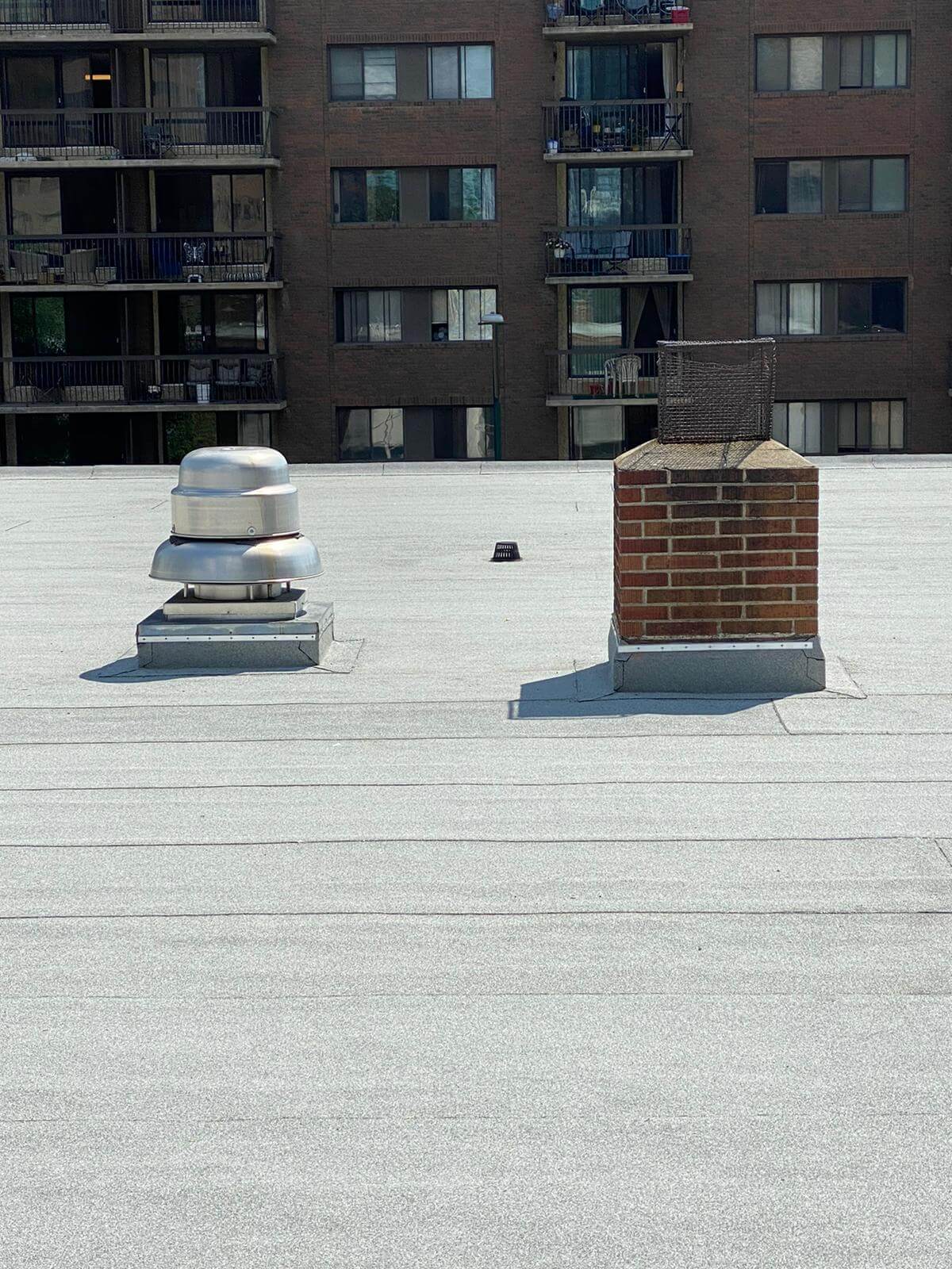 Commercial flat roof being repaired quickly to minimize business disruption in Calgary